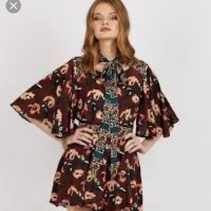 Floral butterfly sleeve romper